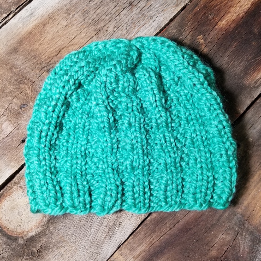 Handmade knitted teal hat